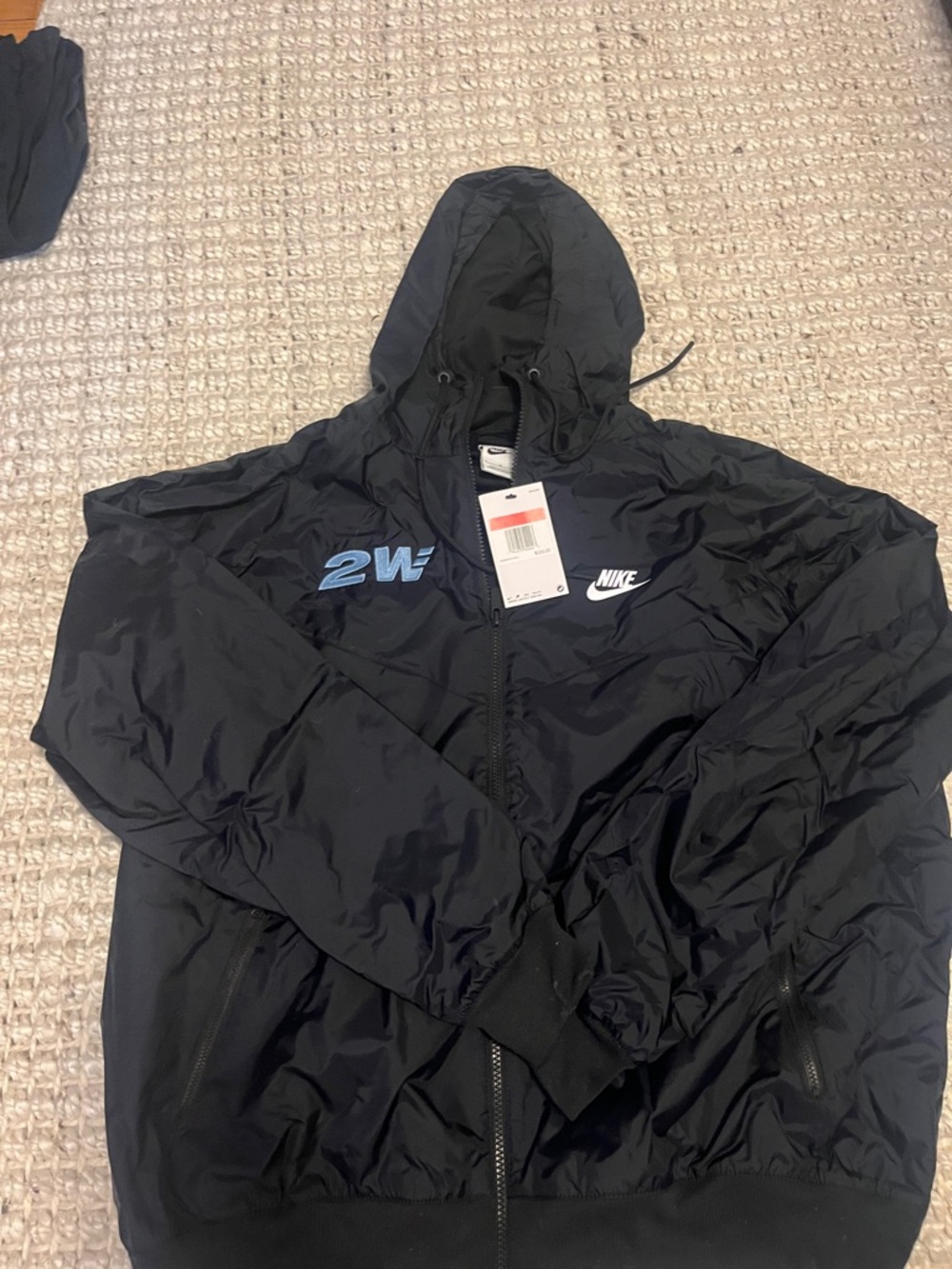 Nike Black Hooded Windbreaker with Light Blue Logo